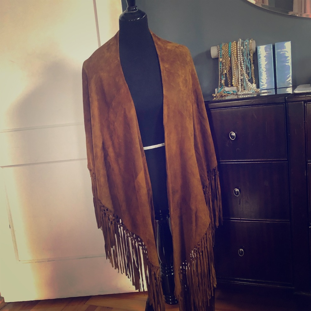 Genuine suede cape.